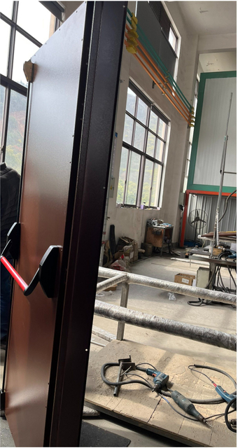 Bespoke Emergency Door with Panic Bar and Rivet Decoration